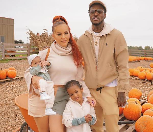 Dc Young Fly with his girlfriend, Jacky Oh and children
