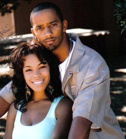 Alexis Fields smiling with her husband, Kevin